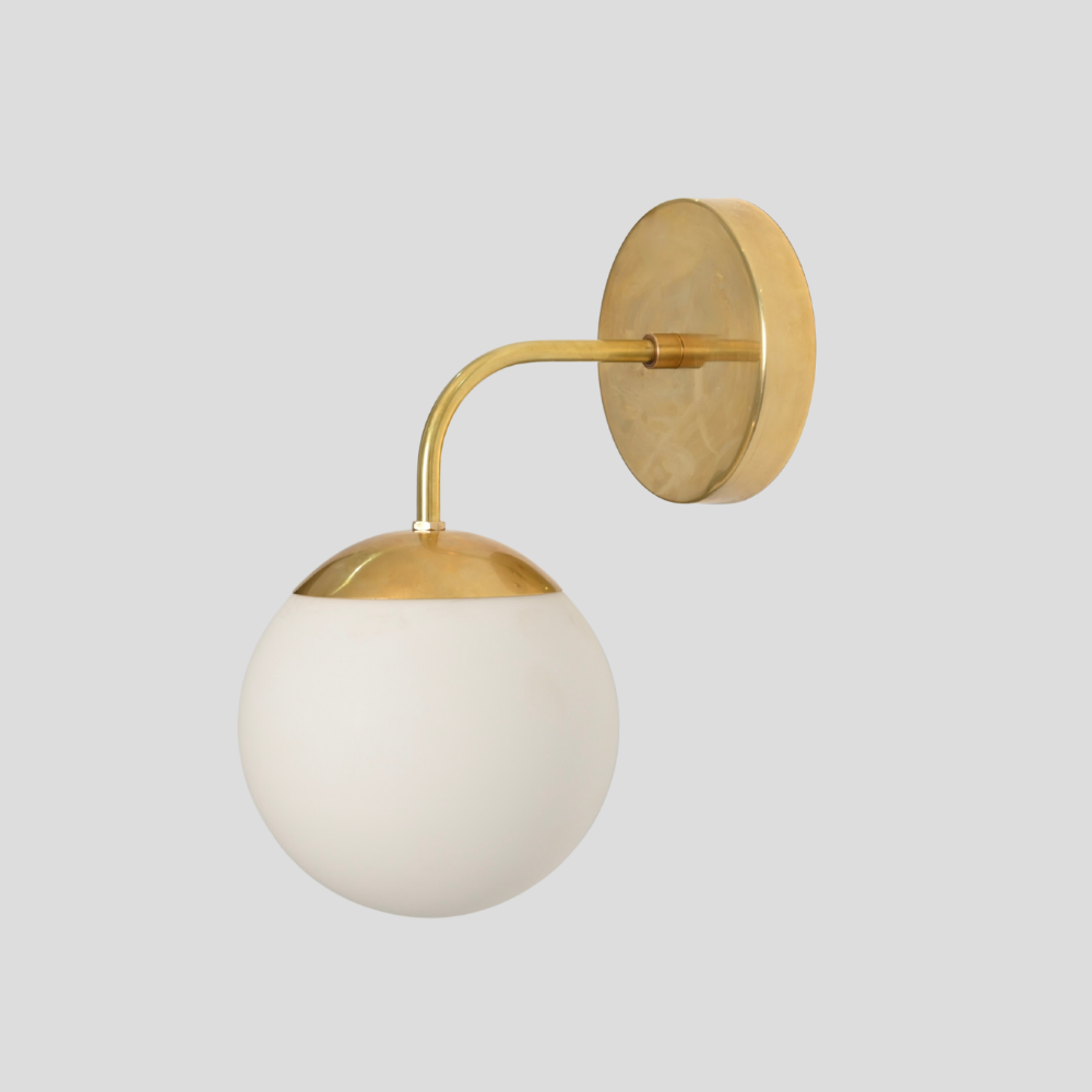 Modern Glass Globe Wall Lamp - Brass Curved Arm Sconce